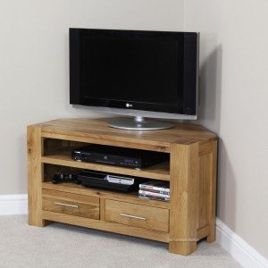 Chunky oak corner TV unit.