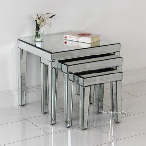 Venetian mirrored nest of three tables.