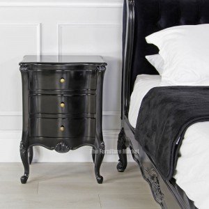 French noir black painted three drawer bedside - front view