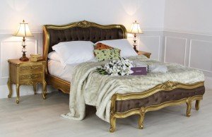 French gold leaf bed with chocolate brown upholstery