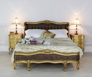 French gold leaf upholstered bed - front view