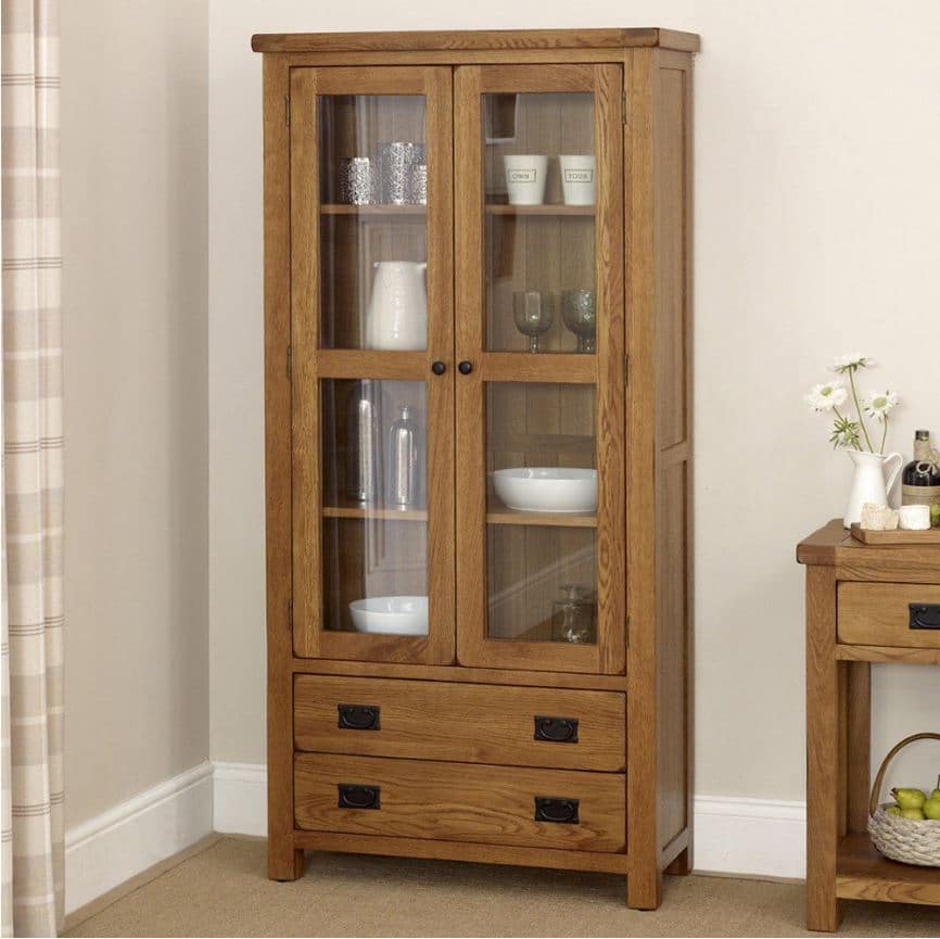 Display Your Treasures in Style with our Rustic Oak Glazed 2 Door 2 Drawer Tall Display Cabinet