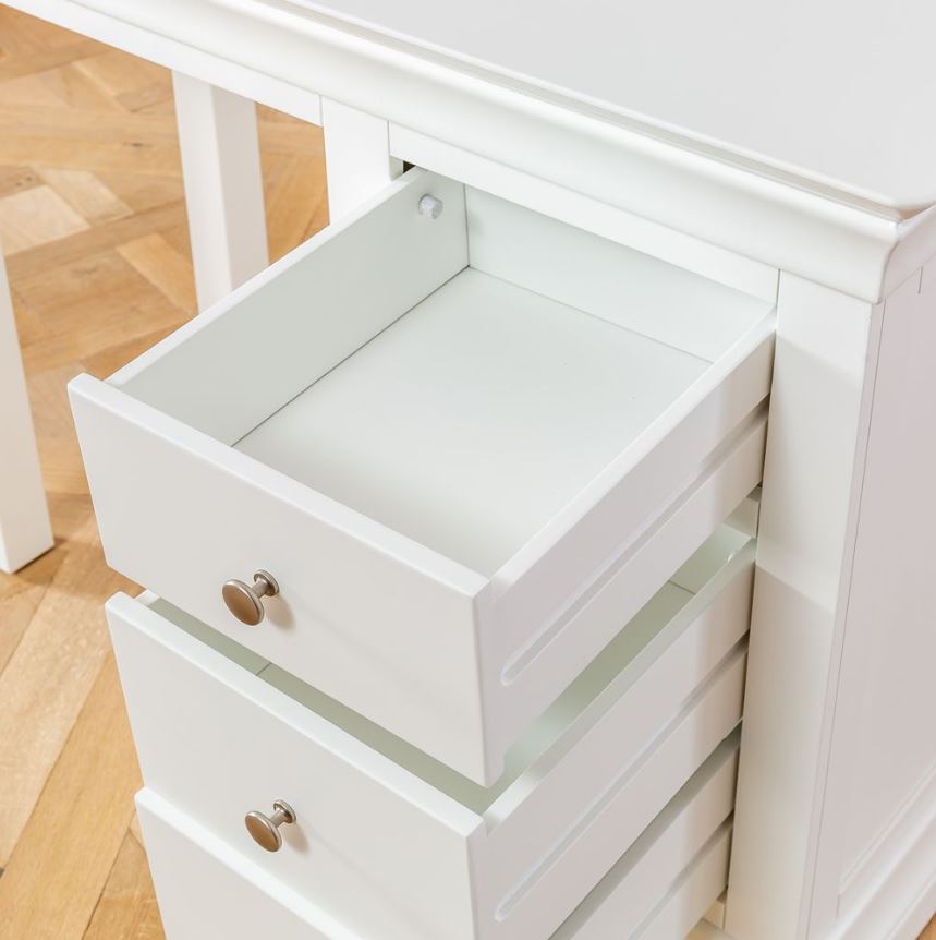 The single side pedestal holds three drawers