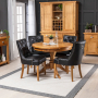 Solid Oak Round Dining Table and 4 Black Faux Leather Scoop Chairs