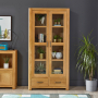 Soho Oak Glazed 2 Door 2 Drawer Tall Display Cabinet Unit